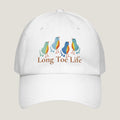 A white baseball cap featuring a graphic of four colorful birds in shades of blue, green, and orange, with the text 'Long Toe Life' printed below in brown. The cap is shown against a plain white background.