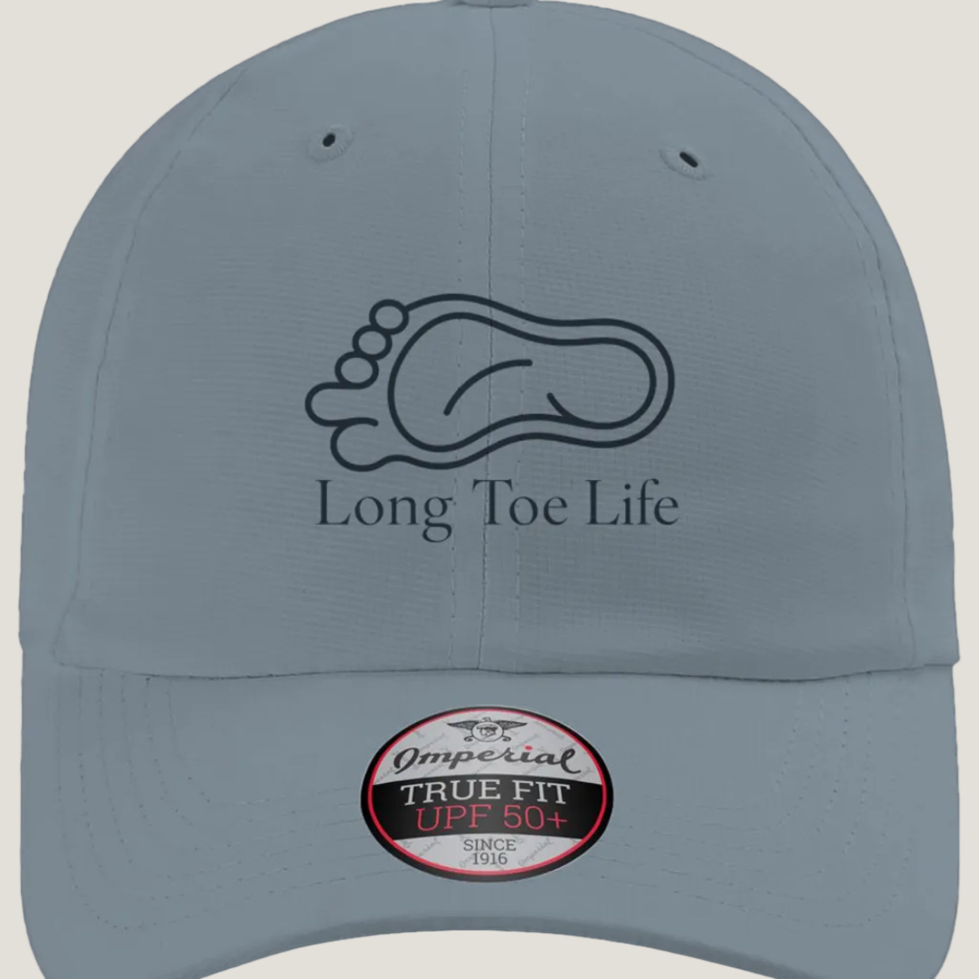A light blue gray baseball cap featuring a blue line art graphic of a foot and the text 'Long Toe Life' on the front.